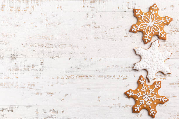 istock white background with Christmas gingerbread snowflakes icing cookies 1466384446