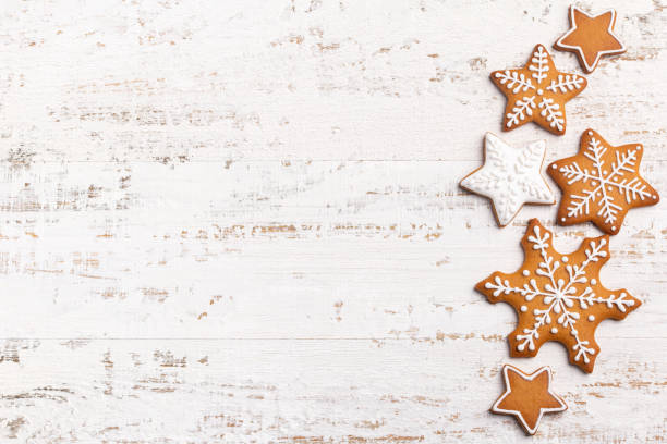 istock white background with homemade gingerbread snowflakes icing cookies 1466384451