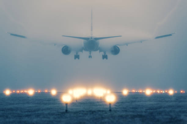 istock Airplane landing in dense fog 1466385531