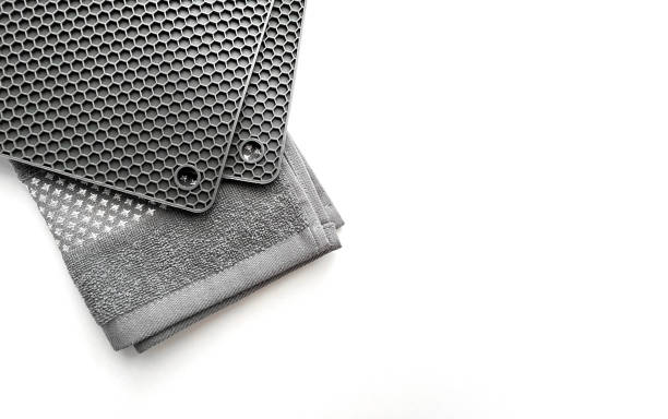 istock Towel and silicone mats. Kitchen utensils on a light background. Banner horizontal, place for text. 1466385616