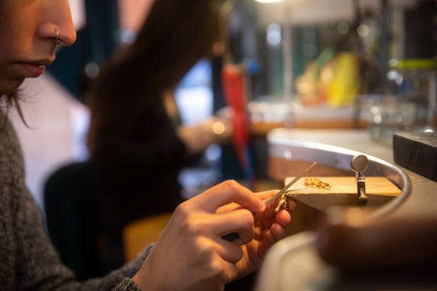 istock Woman jeweller working 1466386933