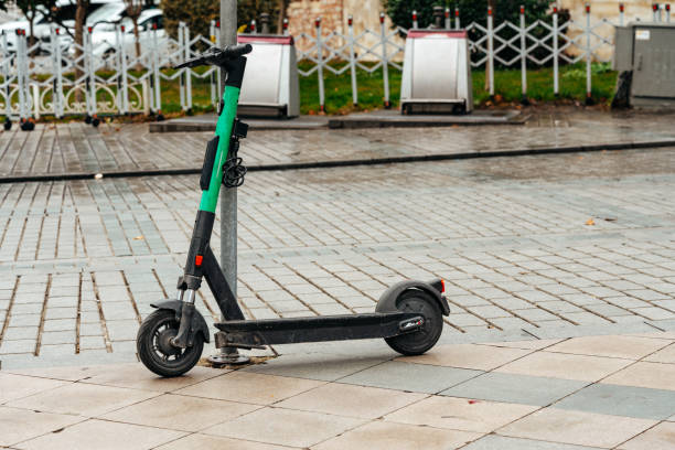 istock Modern electric scooter parked on the street 1466386963