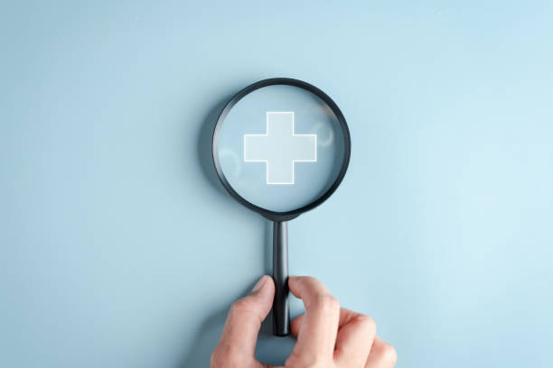 Health insurance concept. Hand people holding Magnifier focus to plus symbol and healthcare medical icon, health and access to welfare health concept. Health insurance concept. Hand people holding Magnifier focus to plus symbol and healthcare medical icon, health and access to welfare health concept. health insurance stock pictures, royalty-free photos & images