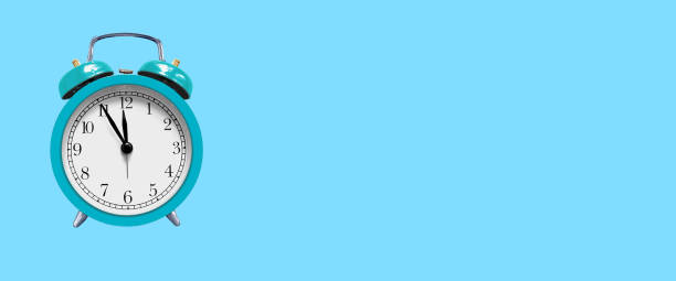 istock Alarm clock on blue background, minimalistic background, concept of time, 1466390159