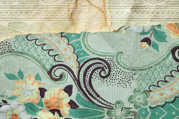 Old wallpaper on the wall. Old wallpaper for texture or background.