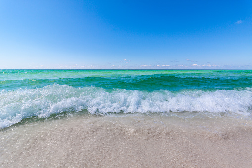 The emerald green waters of the Gulf of Mexico are commonly referred to as the Emerald Coast, displaying it's wide array of colors and tones and sunshine.
