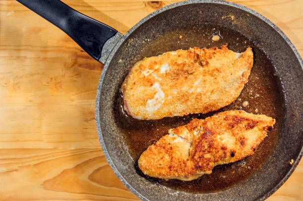 istock Grilled chicken breast or fillet on iron pan. Top view 1466403853