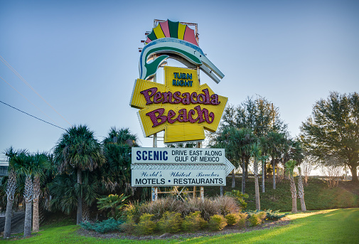 The famous Pensacola beach sign at dawn, before it was replaced for repairs in 2019