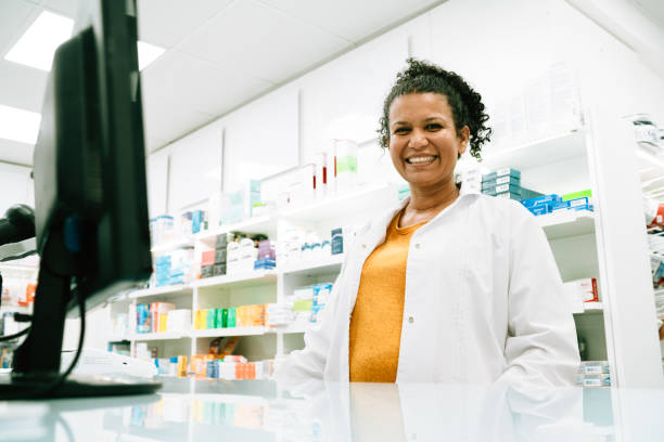 istock Pregnant Pharmacist Portrait at work 1466414964