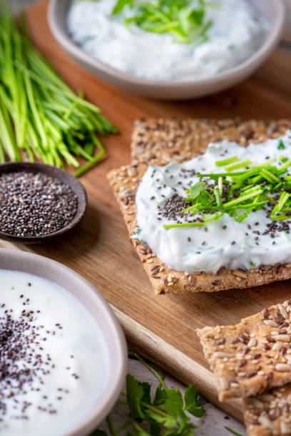 istock Crispbread, fresh curd, herbs and chia seeds 1466415677