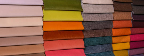 istock Samples of furniture fabrics.Multicolor fabric texture background. 1466415752