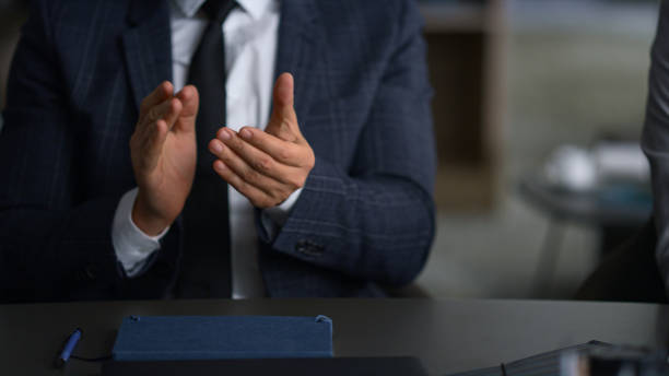 istock Business team clapping hands cheering together celebrate successful product. 1466417829