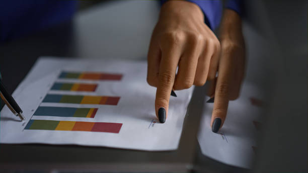 istock Executive woman hands analyze diagram show finance chart information in office. 1466419576