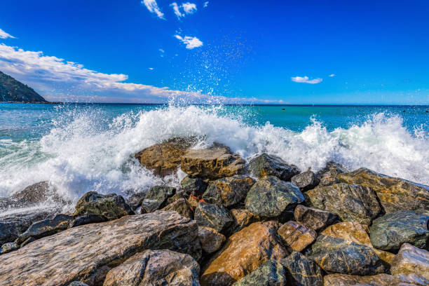 Waves crash the coast of Levanto, Italy. Liguria region