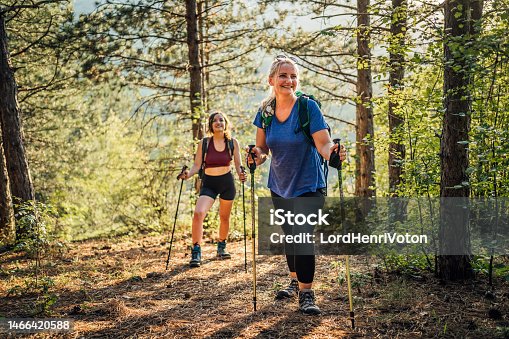 istock Mother and daughter on hiking in the forest 1466420588
