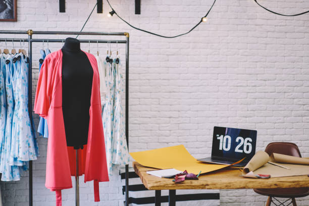 istock Mannequin with pink dress in atelier 1466426501