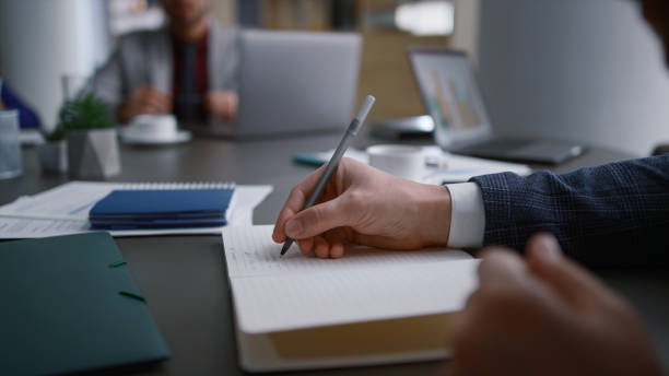 istock Office manager checking information discussing business partner on conference. 1466428593