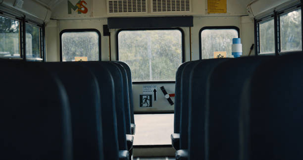 istock Interior school bus staying empty on parking close up. Vehicle comfortable seats 1466433034