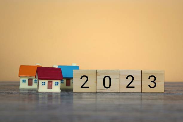 istock Wooden blocks with number 2023 and house. 1466434701