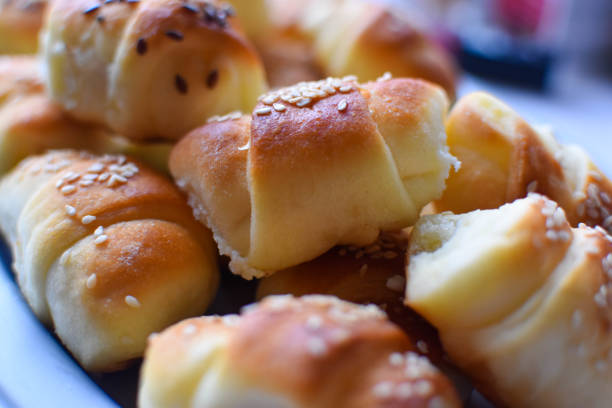 Salty rolls with cheese and sesame seeds