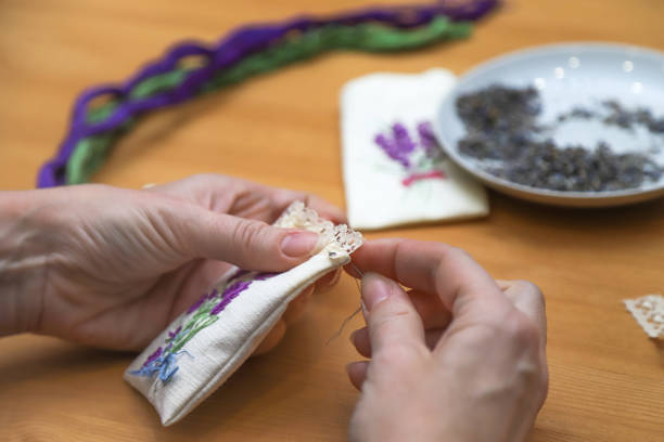 istock Making lavender aromatherapy sachet with floral embroidery at home. Zero waste DIY gift. Photo with selective focus 1466435447