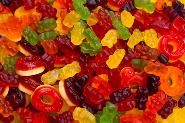 istock Assorted colorful gummy candies. Jelly donuts. Jelly bears. 1466436759