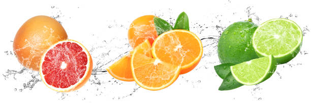 istock Fresh Fruits with water splash on isolated white background | grapefruit, orange and lime 1466440211