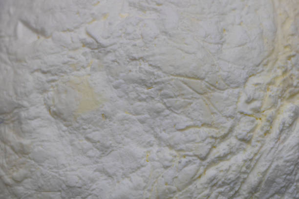istock The Smooth and Tangy Texture of Cow's Cheese: A Close-Up View 1466440431