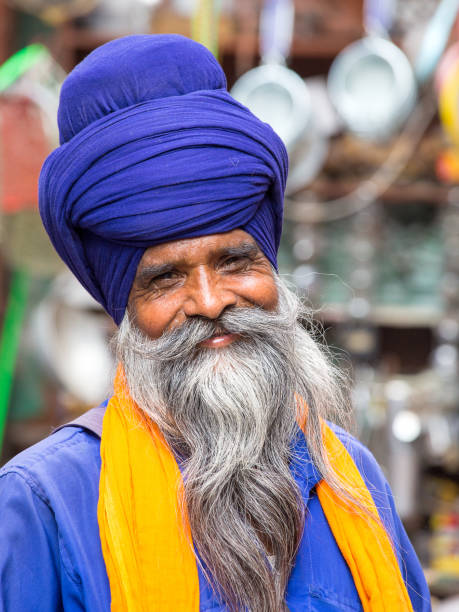 Sikh man visiting the Golden Temple in Amritsar, Punjab, India. stock photo