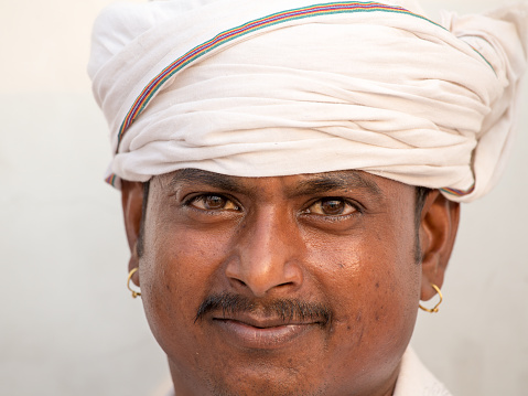 Amritsar, India - sep 26, 2014 : Unidentified Sikh man visiting the Golden Temple in Amritsar, Punjab, India. Sikh pilgrims travel from all over India to pray at this holy site.