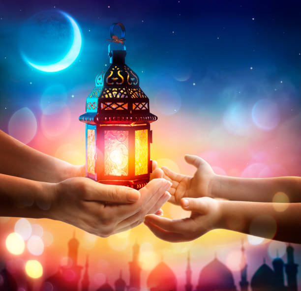 istock Ramadan Kareem - Arabic Lantern Glowing In The Night 1466449988