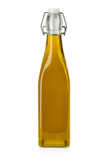 istock Extra virgin olive oil in glass bottle 1466454050