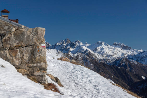 istock Winter hike path into Orobic mountains, San Simone, Bergamo, Italy 1466459189