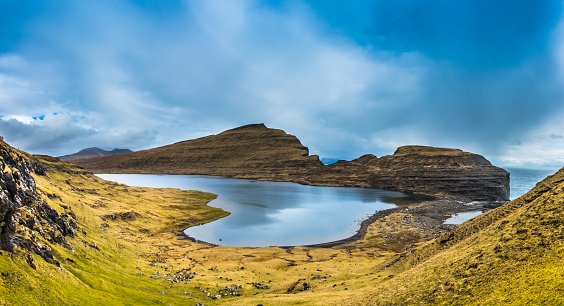 Landscape. Mounty lake in Faroe island. iIncredible view of lake in the mountains