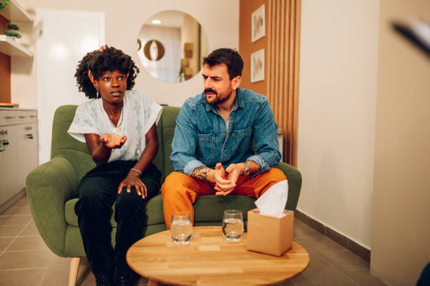 istock Diverse couple on a therapy session in a psychologist office 1466463864