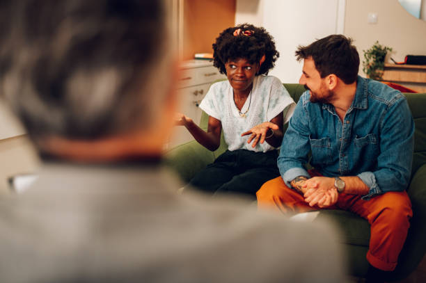 istock Diverse couple on a therapy session in a psychologist office 1466463870