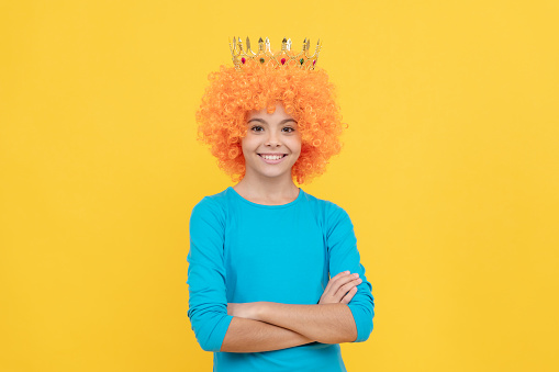 happy teen girl in fancy clown wig wear queen crown, girlish.