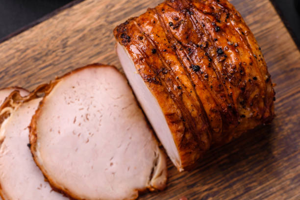 istock Delicious fresh smoked meat or ham with spices and herbs 1466465953