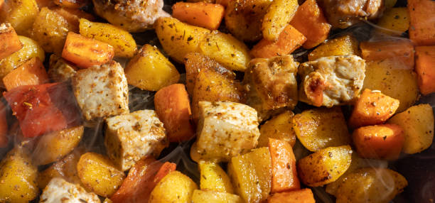 three glass containers with roasted cubed potato, sweet potato and zucchini, vegetarian meal prep and healthy homemade recipes