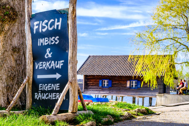 typical sign for a fish selling shop in germany - photo