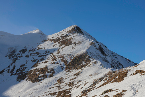 Winter view of Lemma peaks and its snowy ridge from Tartano pass, Orobic Alps, Bergamo, Lombardy. Italy