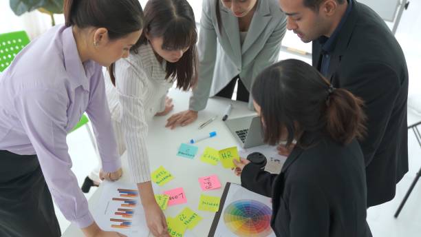 istock Business people proficiently discuss work project on meeting table . Corporate business team collaboration concept . 1466478084