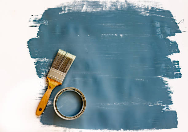 Hand painting with paintbrush on white background