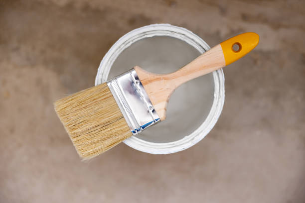 istock Paint can with a paint brush 1466480684