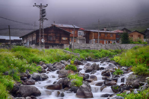 creek and wonderful nature houses - long exposure imagens e fotografias de stock