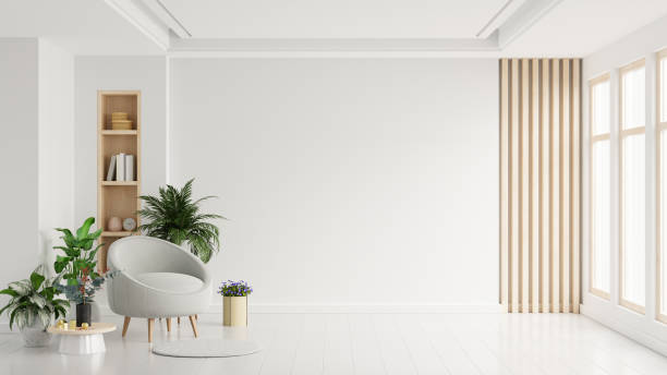istock Modern minimalist interior with an armchair on empty white color wall background. 1466506346