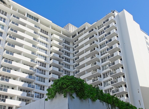 Apartment structure in downtown Miami Beach Florida. Typical mid rise building on Ocean avenue housing both full and part time residents in this beach community.
