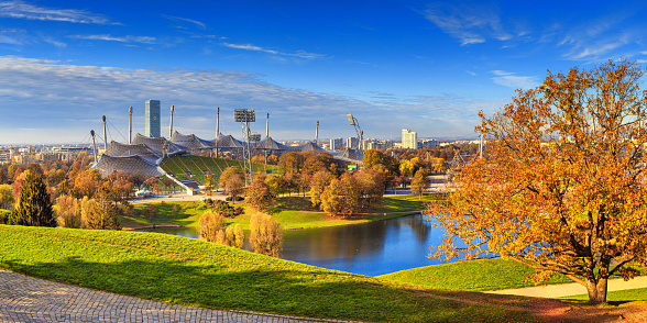 Autumn cityscape - view of the Olympiapark or Olympic Park and Olympic Lake in Munich, Bavaria, Germany, 14 November, 2022