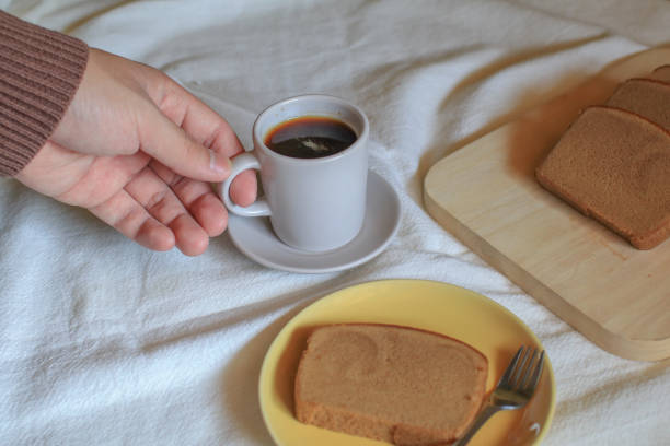 istock Hot coffee with butter bread on white background. Morning Breakfast concept. Minimal vintage tone. Top view flat lay with copy space for your text 1466518901