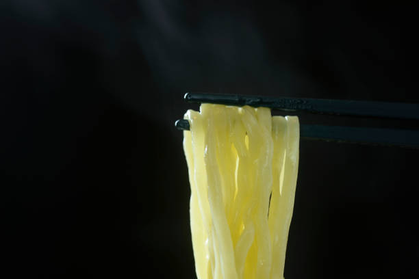 istock Ramen and steam lifted with chopsticks 1466521651